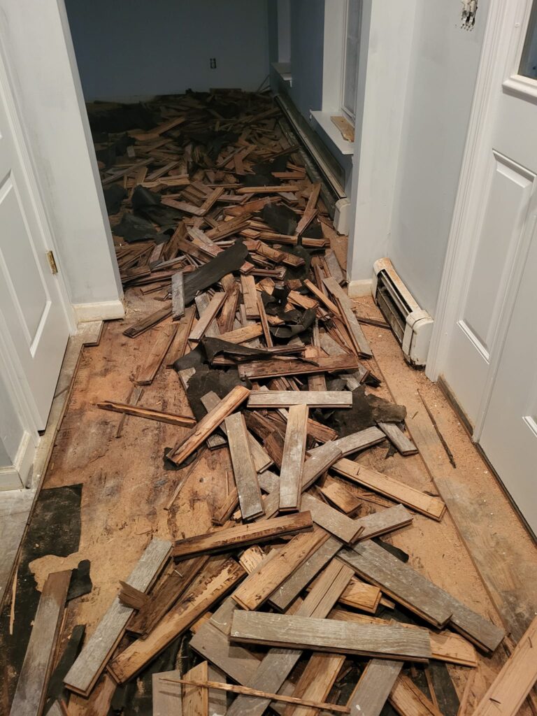 Virgen Floors - Hallway floor install before